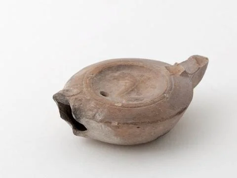 RECORD DATE NOT STATED  Oil lamp. Dolphin. Terracotta. High Empire. Paris,... Stock Photos