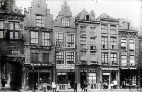 RECORD DATE NOT STATED Old facades to the right of the church arch, before... Fotos de archivo