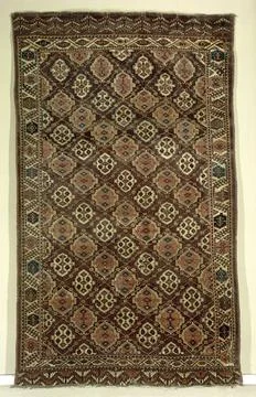 RECORD DATE NOT STATED  Oriental carpet with gridwork and flowers, Tschaud... Stock Photos