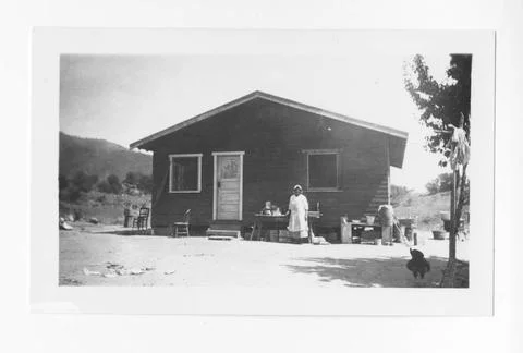 RECORD DATE NOT STATED Original caption: Margaret Amago. 4 room frame cott... Stock Photos