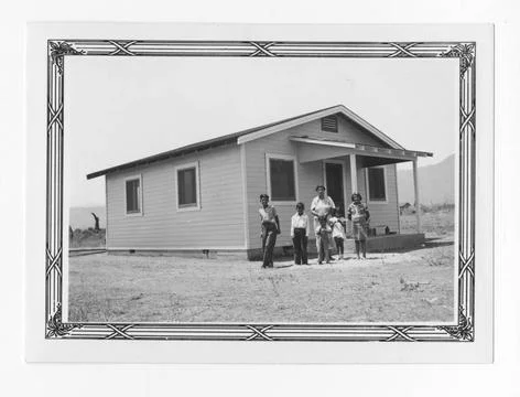 RECORD DATE NOT STATED Original caption: Edward Aguilar new frame house un... Stock Photos