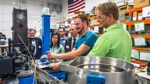 RECORD DATE NOT STATED  The Orion team visits Paradigm, a precision parts ... Stock Photos
