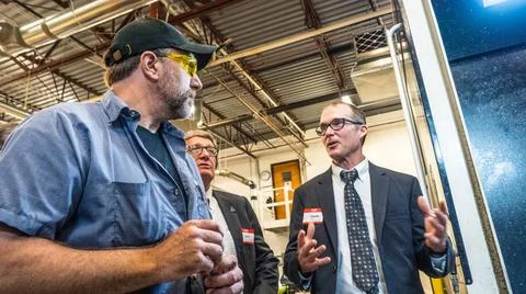 RECORD DATE NOT STATED  The Orion team visits Paradigm, a precision parts ... Stock Photos