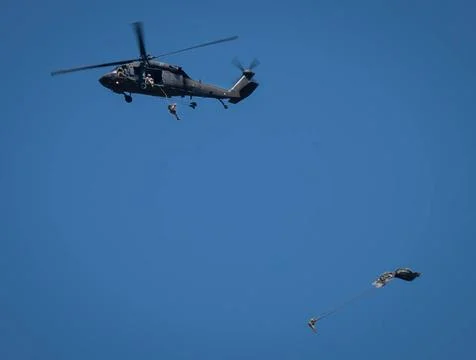 RECORD DATE NOT STATED Parachuting Rangers jump from an Army UH-60 Blackha... Stock Photos