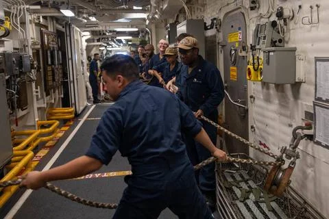RECORD DATE NOT STATED PHILIPPINE SEA (Sept. 5, 2022) Sailors handle line ... Photos