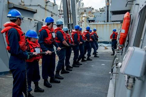 RECORD DATE NOT STATED PHILIPPINE SEA (March 10, 2022) Sailors handle line... Photos