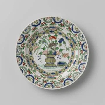 RECORD DATE NOT STATED  Plate with a flower basket and precious objects, a... Foto stock