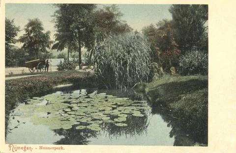 RECORD DATE NOT STATED Pond in park and man with handcart Copyright: xpiem... Fotos de archivo