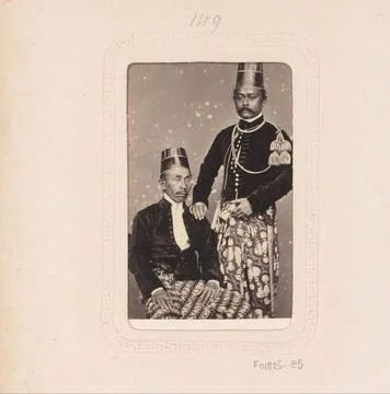 RECORD DATE NOT STATED  Portrait of two Indonesian men, Woodbury & Page, 1... Stock Photos