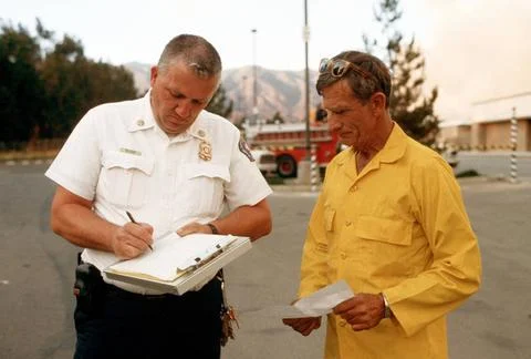 RECORD DATE NOT STATED Rodney Stemen, right, lead firefighters from the 63... Stock Photos