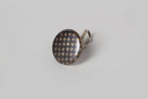 RECORD DATE NOT STATED  Round cuff knot of Niello silver with star pattern... Stock Photos