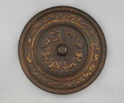 RECORD DATE NOT STATED  Round mirror, 1700. Bronze. Cernuschi Museum, Asia... Stock Photos