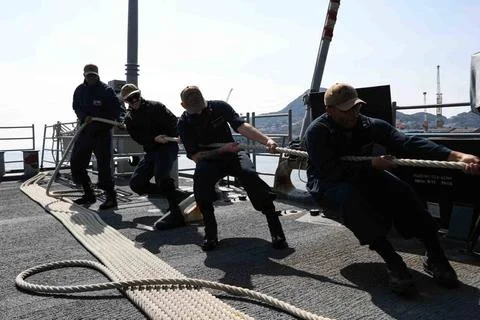 RECORD DATE NOT STATED SASEBO, Japan (March 3, 2022) Sailors handle line a... Photos