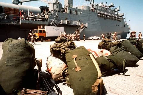 RECORD DATE NOT STATED Seabags and packs are lined up on the pier near the... Foto stock