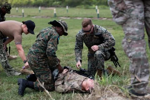 RECORD DATE NOT STATED Service members from partner nations train to react... Stock Photos