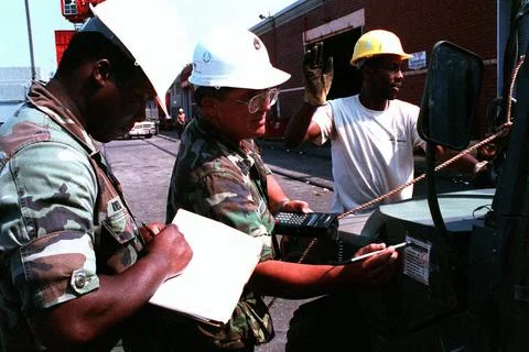 RECORD DATE NOT STATED SGT. 1ST Class Moody and SPEC. Rivers take bar code... Stock Photos