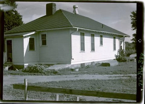 RECORD DATE NOT STATED Side View of a House, Note Door to Root Cellar. 191... Stock Photos