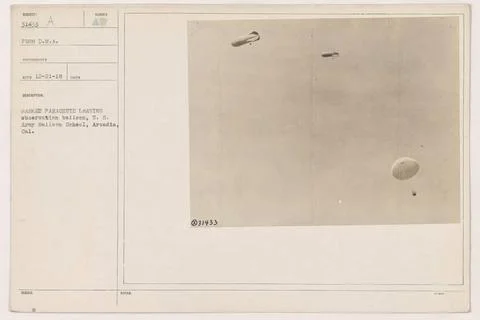 RECORD DATE NOT STATED  Soldier using a parachute to exit an observation b... Stock Photos