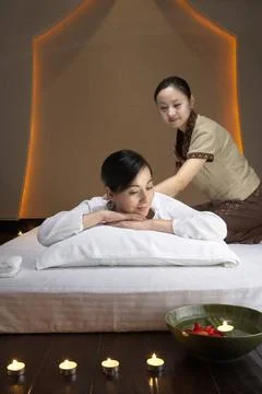 RECORD DATE NOT STATED Spa attendant massaging Chinese woman Beijing China... Stock Photos