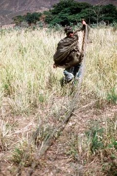 RECORD DATE NOT STATED A Special Forces soldier gathers his parachute foll... Stock Photos