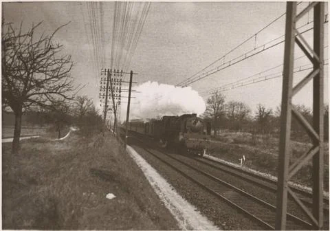 RECORD DATE NOT STATED Steam locomotive with passenger cars on the line be... Stock-Fotos