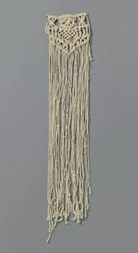 RECORD DATE NOT STATED  Strip macramÃ with a few buttons in long fringes, .. Stock Photos