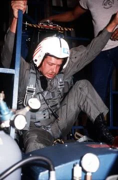 RECORD DATE NOT STATED A student practices on the dynamic ejection seat tr... Stock Photos