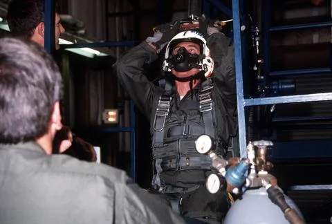 RECORD DATE NOT STATED A student practices on the dynamic ejection seat tr... Stock Photos