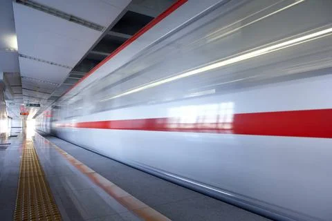 RECORD DATE NOT STATED Subway train speeding past platform Beijing China C... Stock Photos