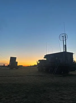 RECORD DATE NOT STATED The Sun rises over a U.S. Patriot site in Slovakia ... Stock Photos