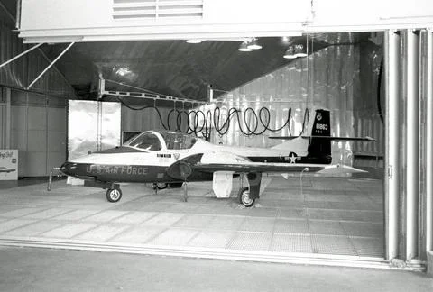 RECORD DATE NOT STATED A T-37B Tweet aircraft is parked in a paint booth a... Stock Photos