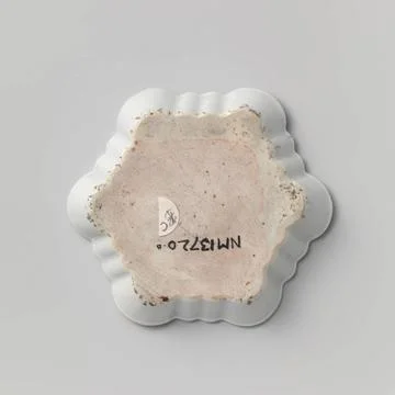 RECORD DATE NOT STATED  Teapot stand with floral scrolls, diaper pattern a... Stockfoto's