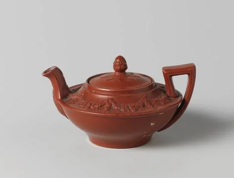 RECORD DATE NOT STATED  Teapot of red hard baked earthenware, children s t... Stock Photos