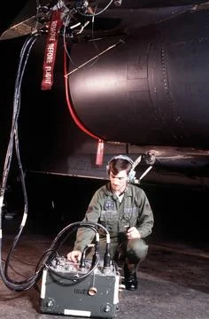 RECORD DATE NOT STATED A technician conducts a flight system inspection on... 스톡 사진