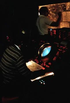 RECORD DATE NOT STATED A technician monitors a radar screen as another mar... Stock-Fotos