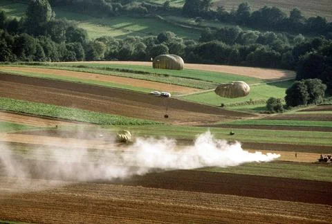 RECORD DATE NOT STATED Three pallets dropped by parachute from a C-130 Her... Stock Photos