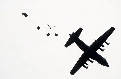 RECORD DATE NOT STATED An underside view of a C-130 Hercules aircraft drop... Stock Photos