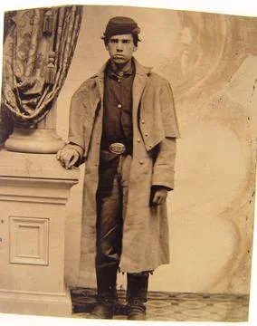 RECORD DATE NOT STATED Unidentified young soldier in Union frock coat next... Stock Photos