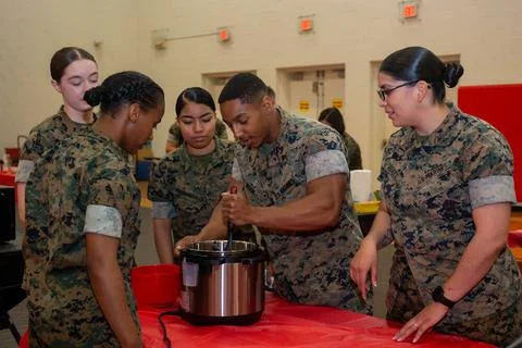 RECORD DATE NOT STATED U.S. Marines prepare meals during a cooking, shoppi... Stock Photos