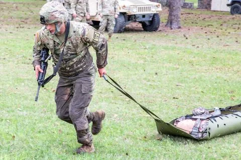 RECORD DATE NOT STATED U.S Army Spc. William Manning, a parachute rigger, ... Stock Photos