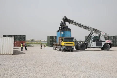 RECORD DATE NOT STATED U.S. Contractors load basic loading ammunition hold... Stock Photos