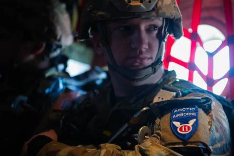 RECORD DATE NOT STATED  A U.S. Army 11th Airborne Division paratrooper wai... Stock Photos