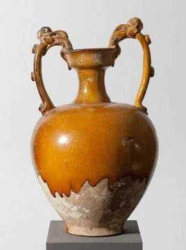 RECORD DATE NOT STATED  Vase with dragon-shaped handles terracotta with am... Photos