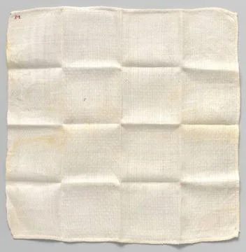 RECORD DATE NOT STATED  White napkin with woven checker pattern, anonymous... Stockfoto's