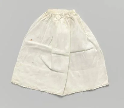 RECORD DATE NOT STATED  White skirt with spreading pattern of coffee beans... Stock Photos