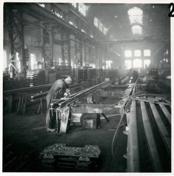 RECORD DATE NOT STATED Work on attaching the tongue root and rail on a com... Stock Photos
