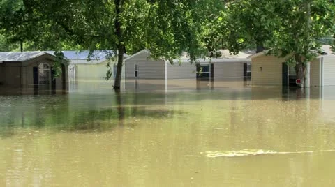 Record flooding in a trailer park Stock Footage 12576348