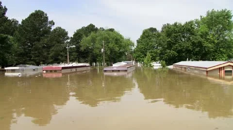 Record flooding in a trailer park Stock Footage 12576606
