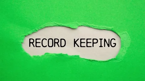 Record keeping message writing on ripped green torn paper on gray background Video stock 285332469