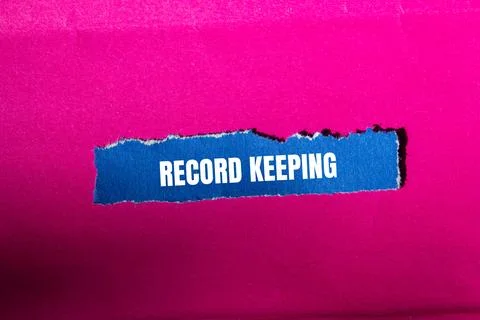Record keeping message written on ripped torn blue paper piece with pink back Stock Photos